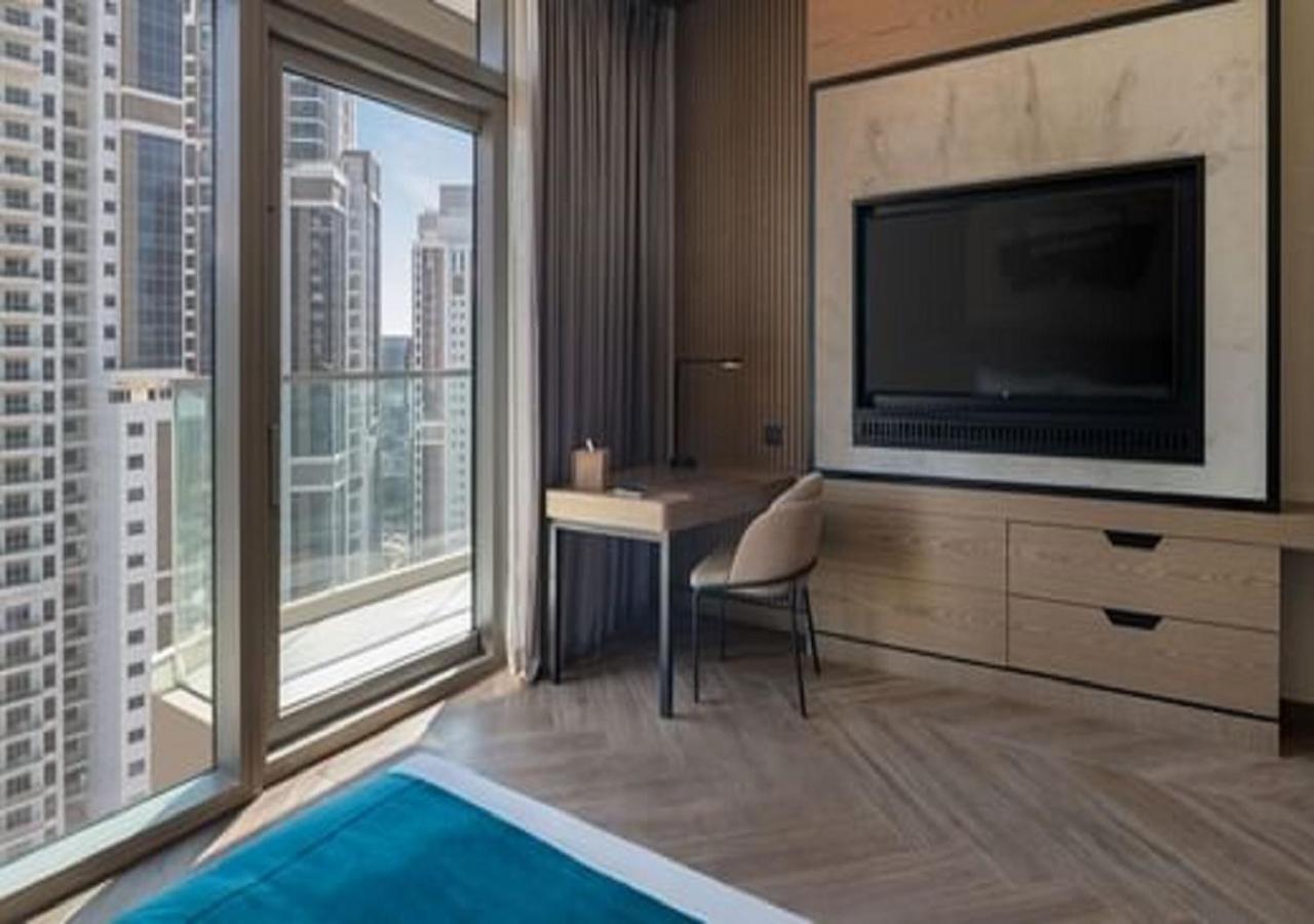 Paramount Hotel Midtown Ντουμπάι Εξωτερικό φωτογραφία A bedroom at the hotel